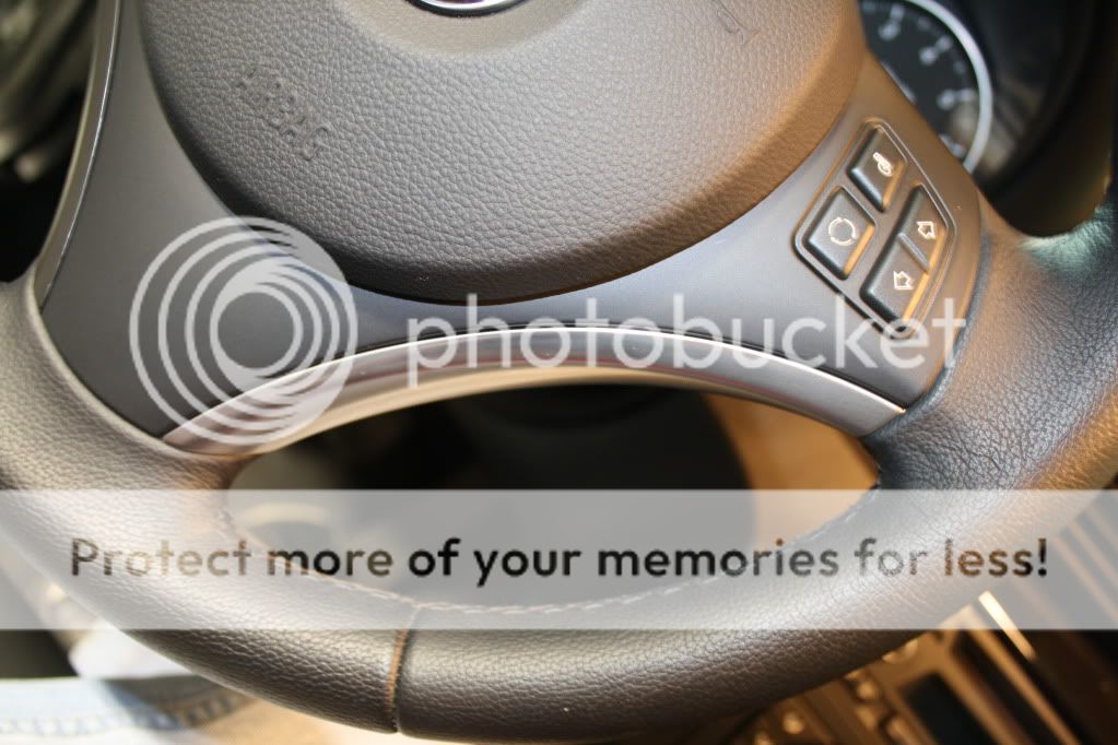 Vinyl wrap silver steering wheel trim